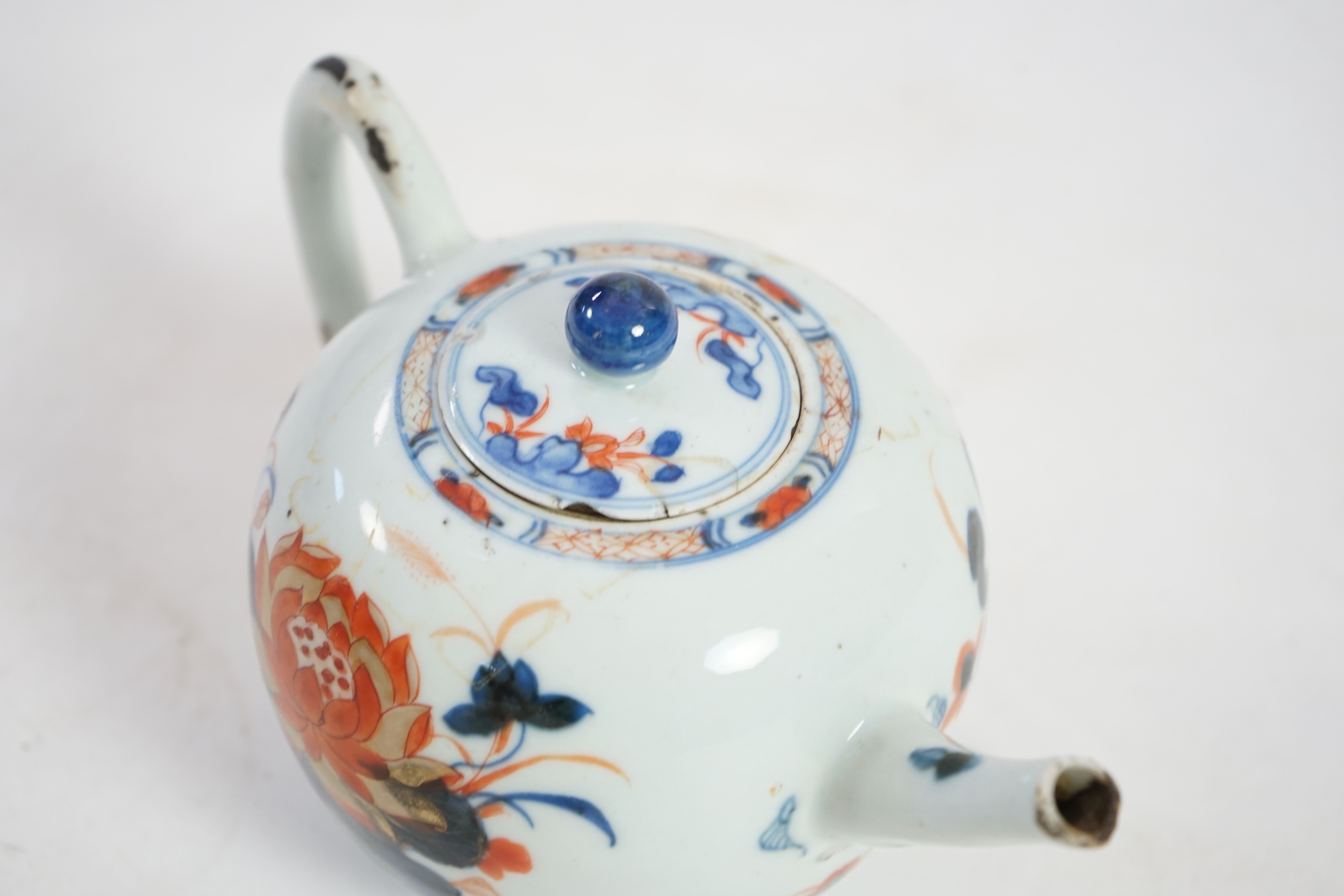 Four 18th century Chinese export polychrome decorated teapots and covers